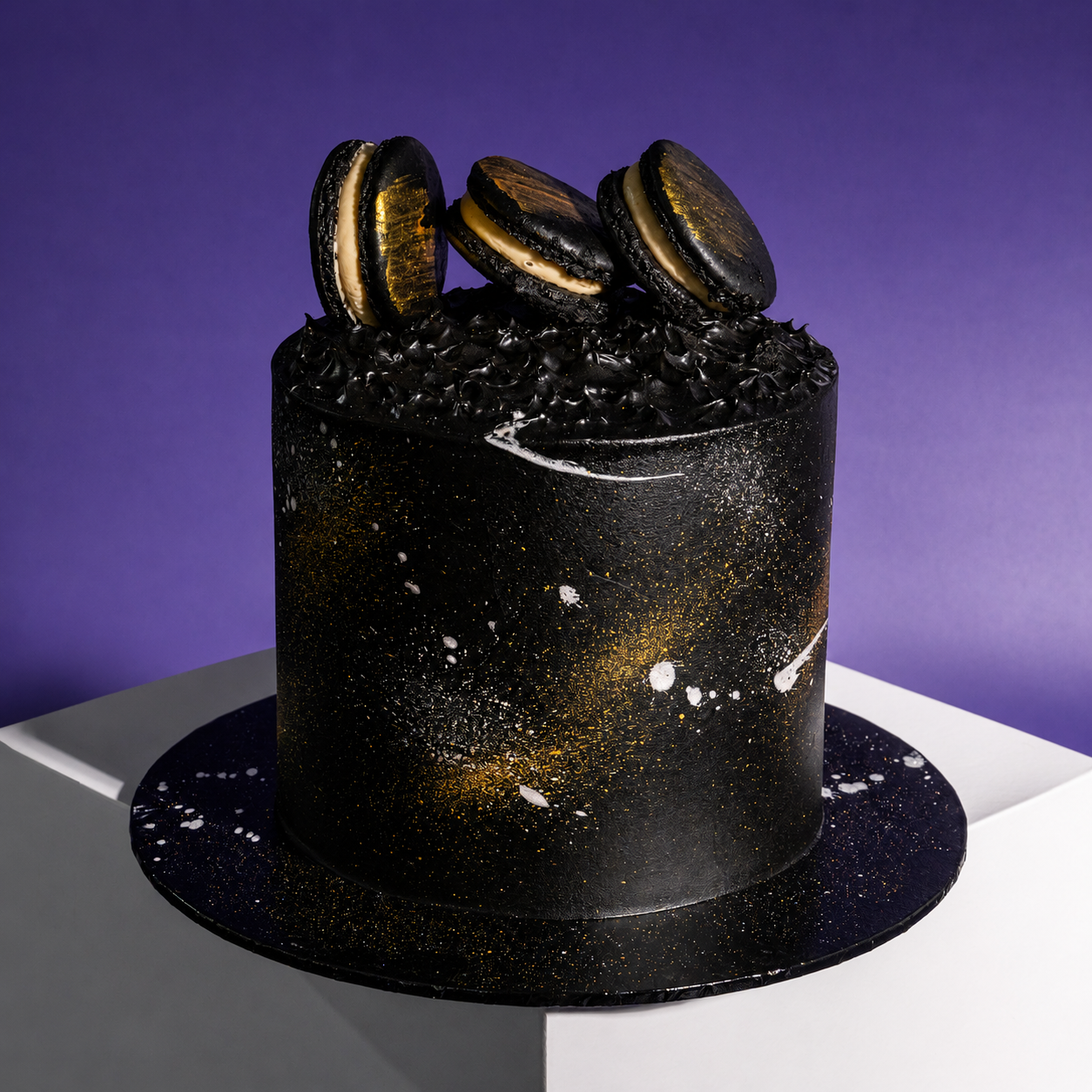 Midnight Gold designer cake in matte black buttercream with gold splatter and dark macarons, Elevete Patisserie KL