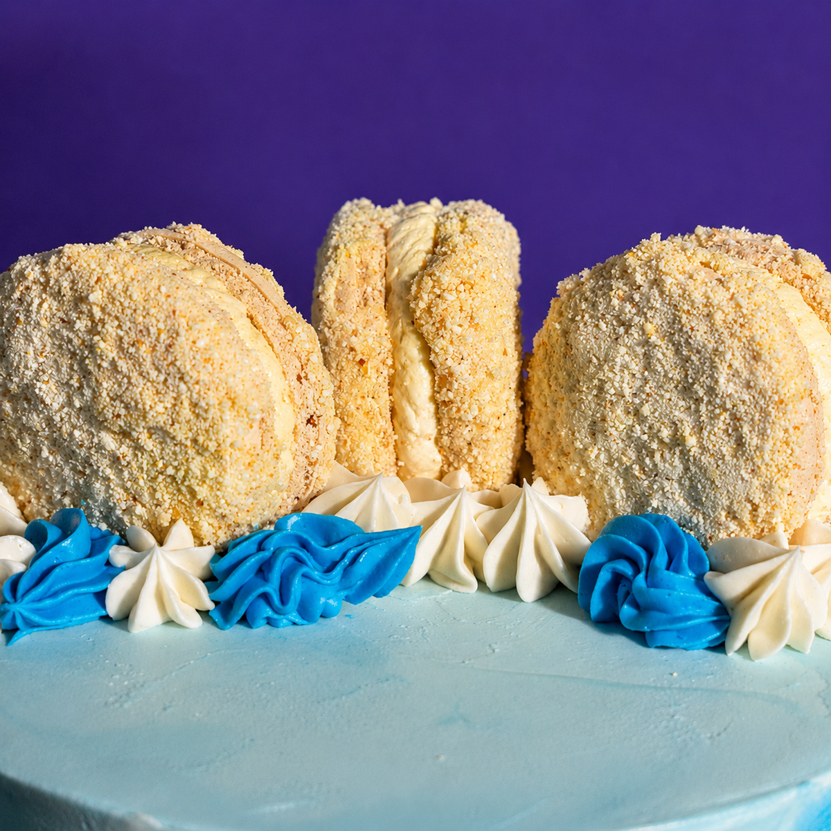 Close-up of the palette-knife blue and white buttercream strokes on the Brushstroke Blue cake