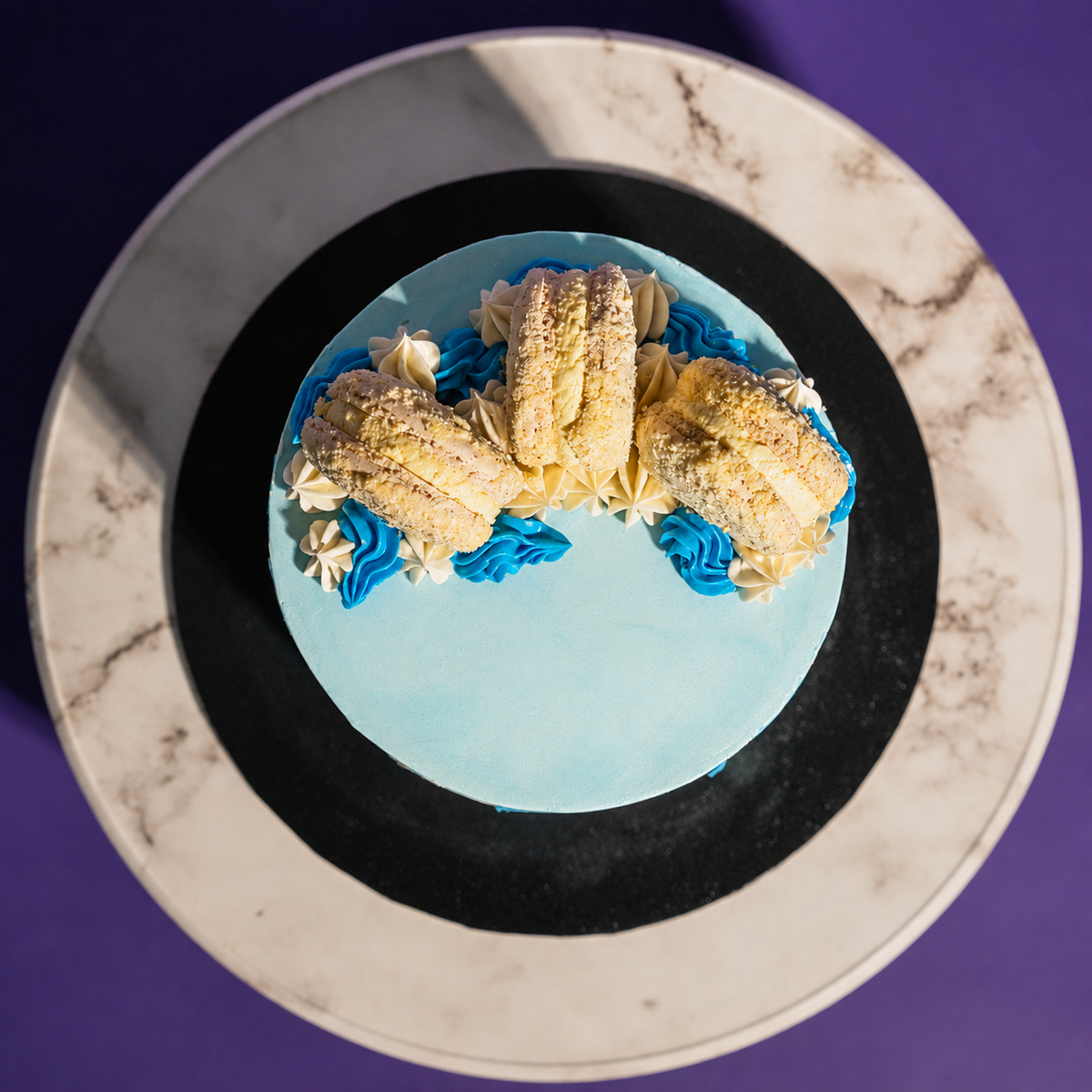 Top-down view of the 5-inch Brushstroke Blue designer cake