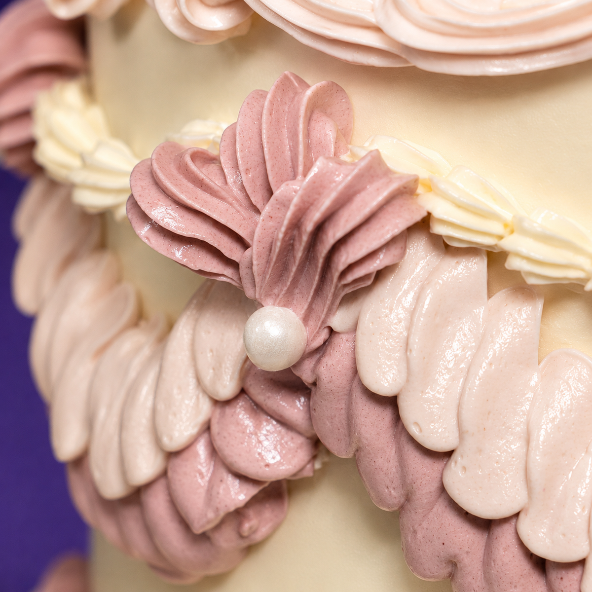 Base ruffle detail on the 5-inch Vintage Bloom designer cake in rose