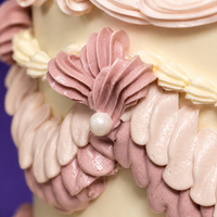 Base ruffle detail on the 5-inch Vintage Bloom designer cake in rose