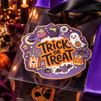 Trick or Treat sticker on the lid of the Halloween cupcake box