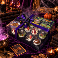 Trick or Treat Halloween cupcake box of 12 in a clear box tied with purple and black ribbon