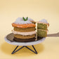 Serving a slice of The Locale Pandan Gula Melaka Mini Cake by Elevete Patisserie