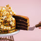 Serving a slice of Popstar 7 Inch Salted Caramel Chocolate Cake - A Signature Cake by Elevete Patisserie